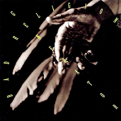 Album cover art showing a hand against a black background with yellow text.