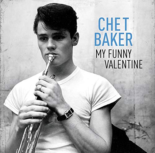 Black and white portrait of Chet Baker holding a trumpet, album cover.