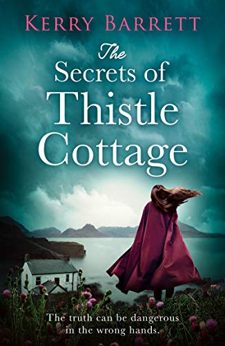A woman in a red cloak stands before a cottage overlooking a misty lake.