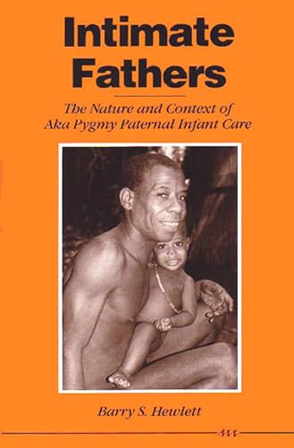Book cover featuring a father holding a baby, titled "Intimate Fathers.