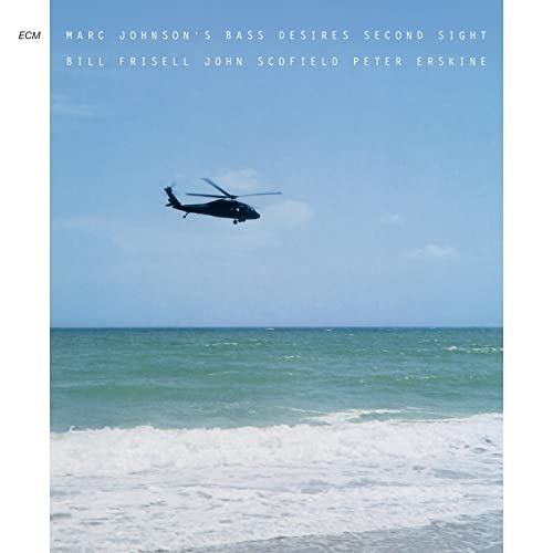 CD cover: ocean scene with a helicopter, text listing musicians.