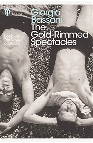 Book cover: two shirtless men lying on a pebbled beach.