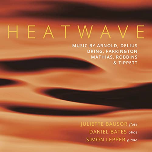 CD cover for "Heatwave" featuring abstract orange sand dune imagery.