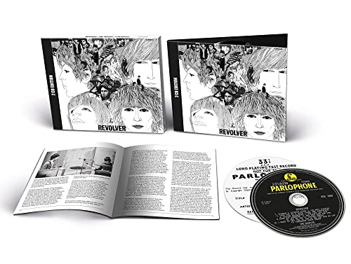 The Beatles’ “Revolver” deluxe edition CD with booklet and photos.