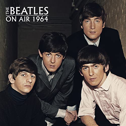 The Beatles in grey suits, portrait from the “On Air 1964” album.