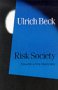 Close-up of a blue book cover with white text: "Ulrich Beck, Risk Society.