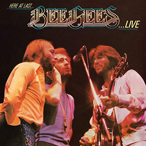 Bee Gees album cover featuring three men with microphones and instruments.