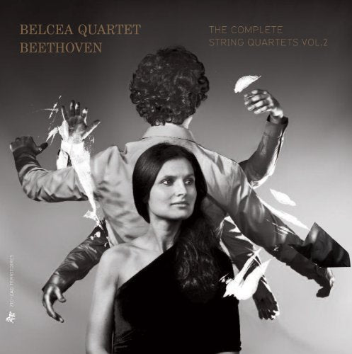 Black and white album cover featuring a woman and man with paper fragments.