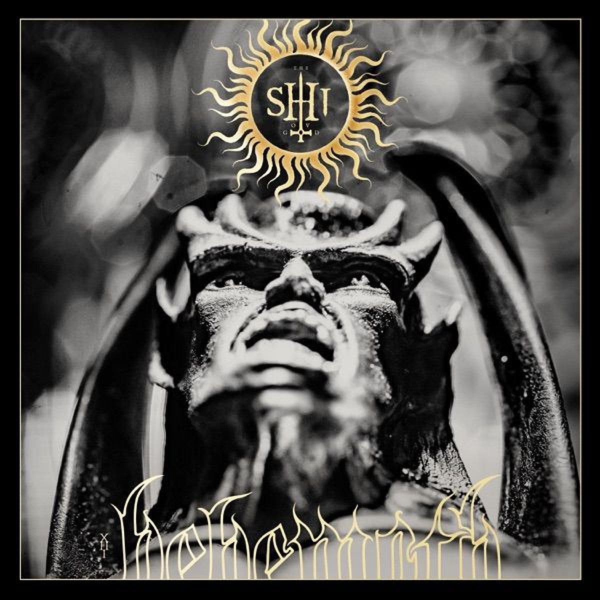 Black and white album cover featuring a sculpted face with a sunburst.