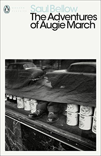 Book cover for The Adventures of Augie March showing cans and shoes under fabric.