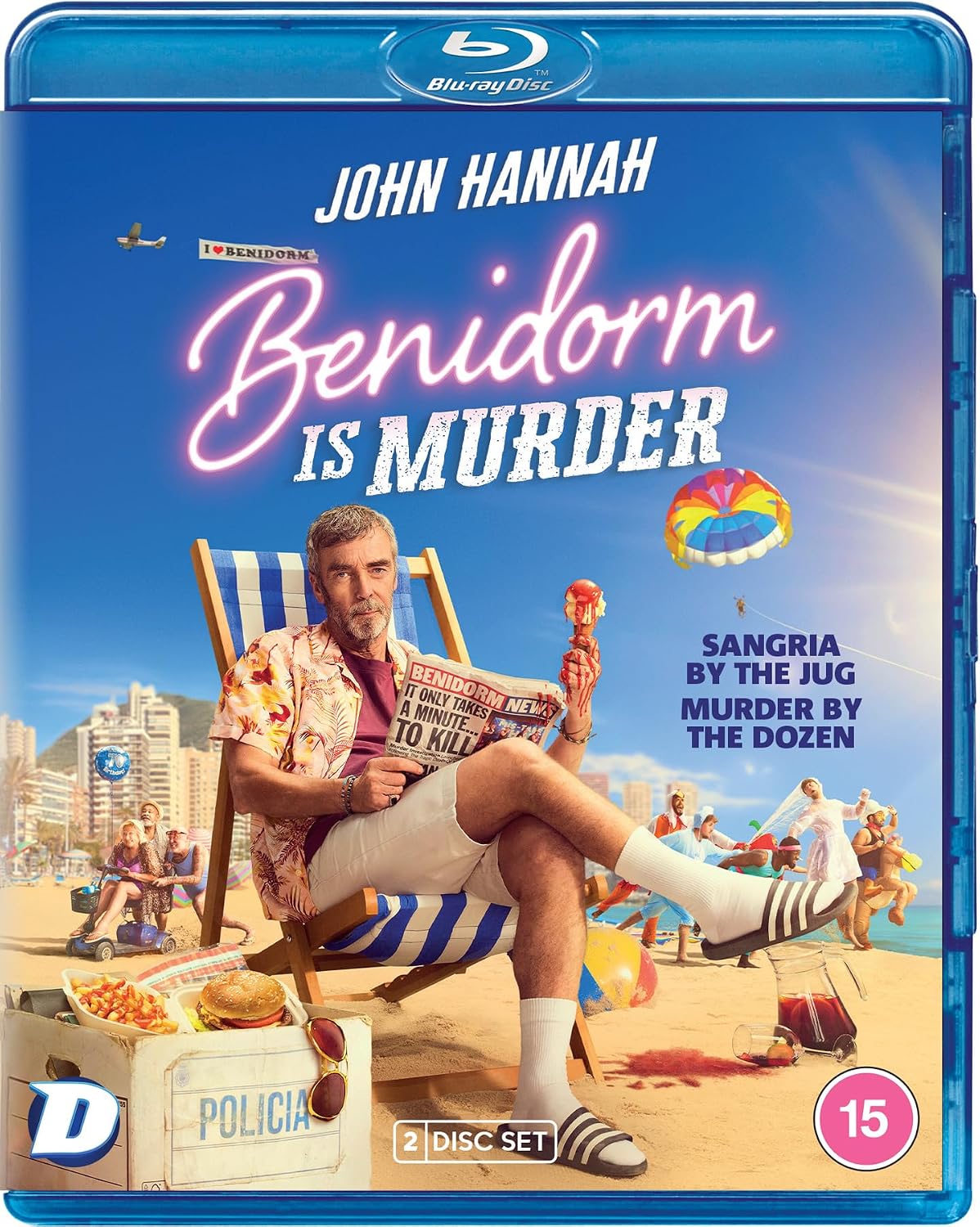 Blu-ray cover for "Benidorm is Murder" featuring John Hannah on a beach.