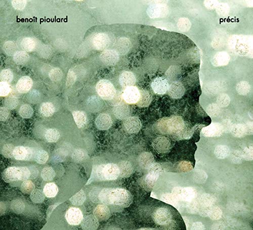 CD cover: green-toned profile portrait with blurred bokeh background.