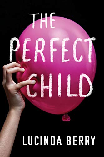 A hand presses into a bright pink balloon against a black background.