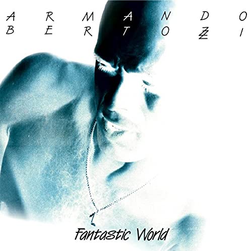 Close-up portrait of a man in blue tones with album title below.