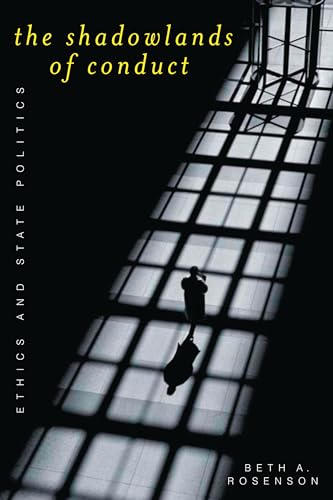 Book cover: dark silhouette against a grid of bright windows.