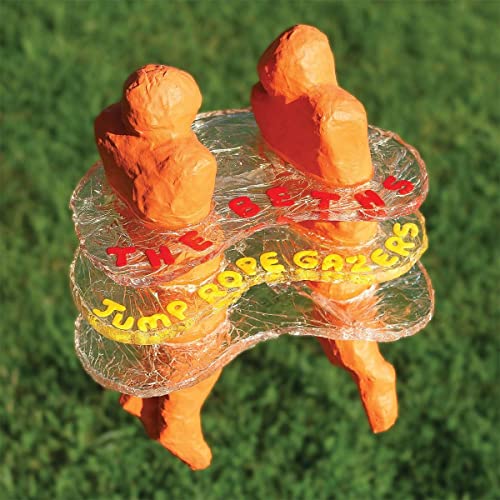 CD cover: orange figures jumping over a clear, text-filled loop.
