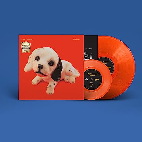 Red vinyl records and album cover featuring a dalmatian puppy.