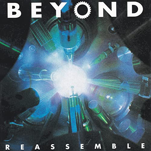 CD cover for Beyond's "Reassemble" featuring glowing mechanical components.