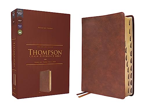 Brown leather-look Bible, closed and open, with thumb indexing.