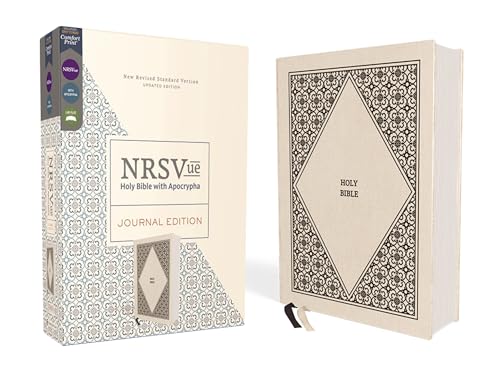 Cream cloth-covered Bible with decorative patterned box, open for display.
