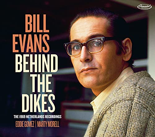 Portrait of Bill Evans wearing glasses with album title text on the left.