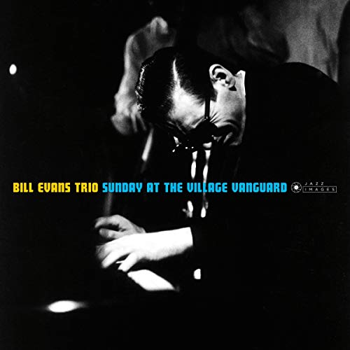 Black and white album cover featuring pianist Bill Evans at the piano.