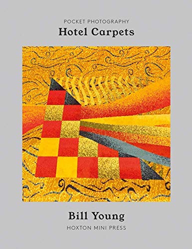 Book cover featuring a colorful, patterned hotel carpet design.