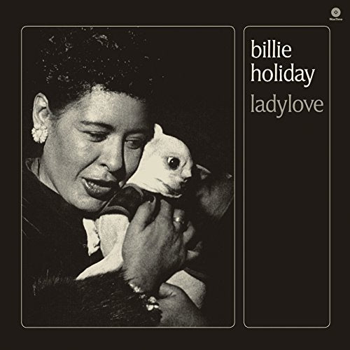 Black and white album cover featuring Billie Holiday with a small dog.
