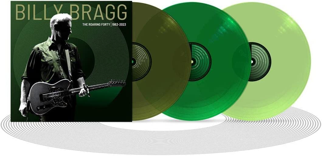 Billy Bragg album cover and three green vinyl records stacked together.
