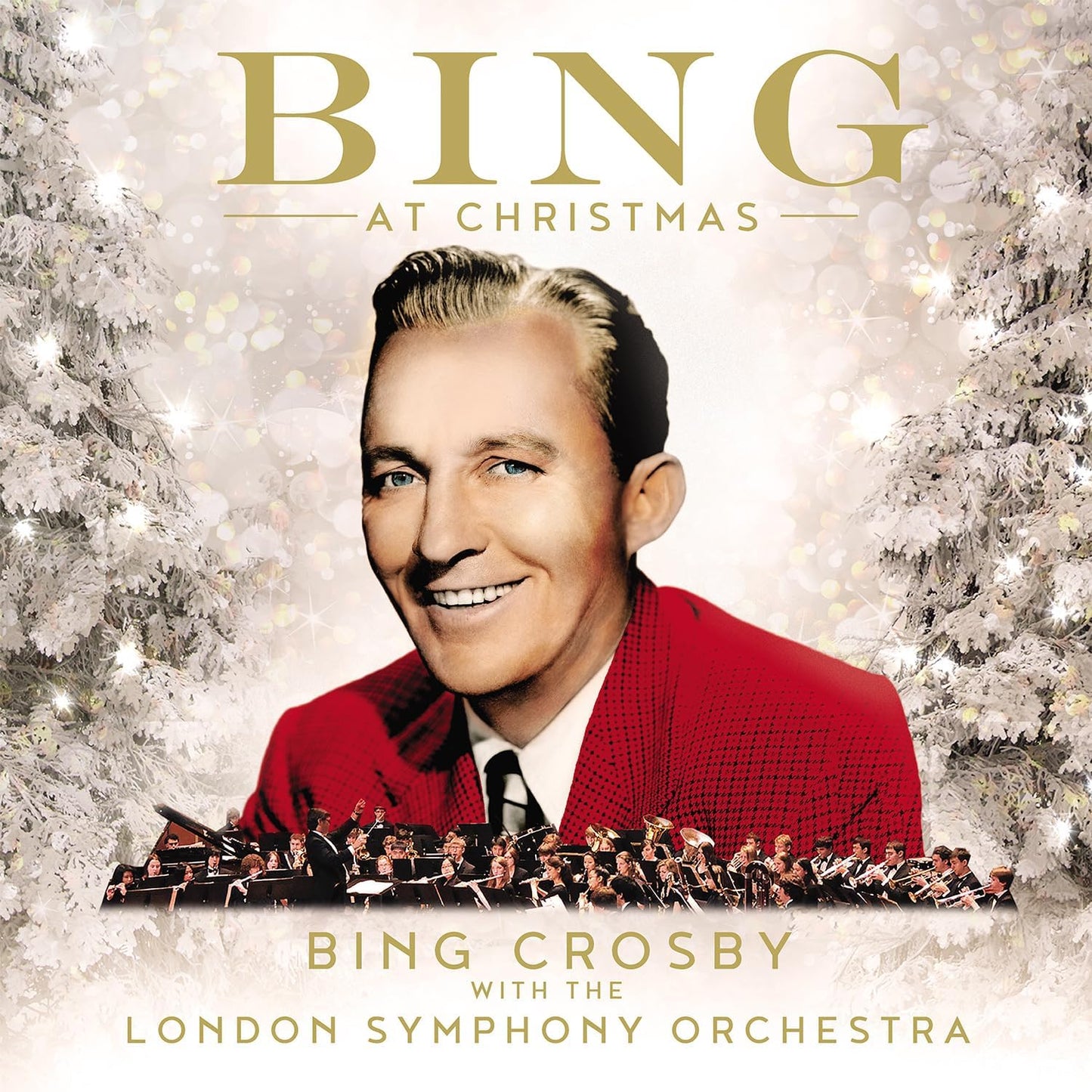 Bing Crosby in red suit, album cover for "Bing At Christmas.