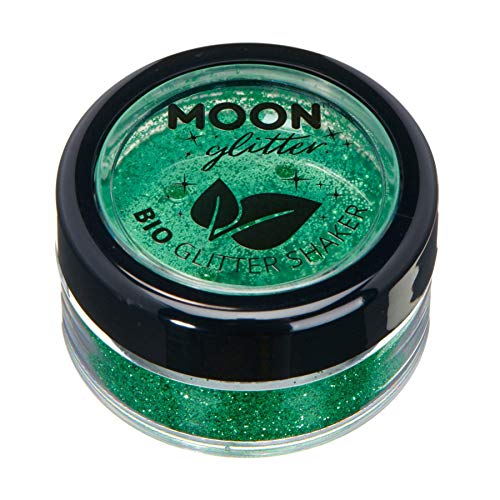 Small round container filled with green cosmetic glitter, labeled Moon Glitter Bio Glitter Shaker.