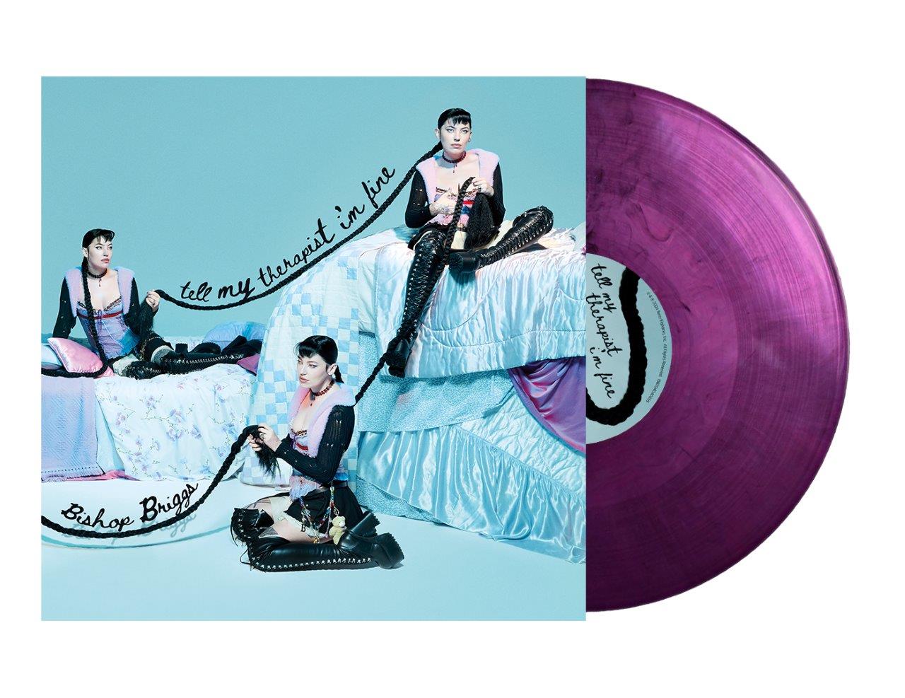 Bishop Briggs album cover with artist portrait and purple vinyl record.