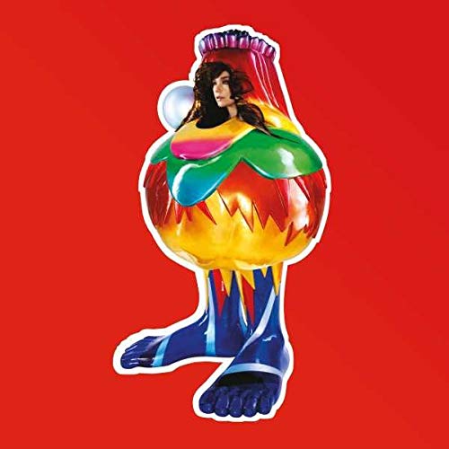 Album cover: woman inside a large, colorful bottle shape on red.