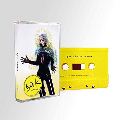 Yellow cassette tape of Björk’s “Vulnicura” with a portrait of the artist.