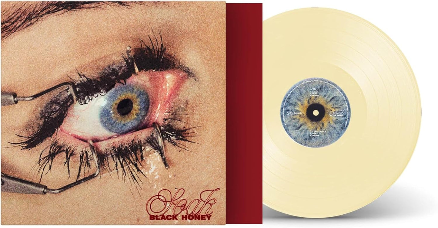 Vinyl record for Black Honey’s “Soak” album, featuring an eye illustration.