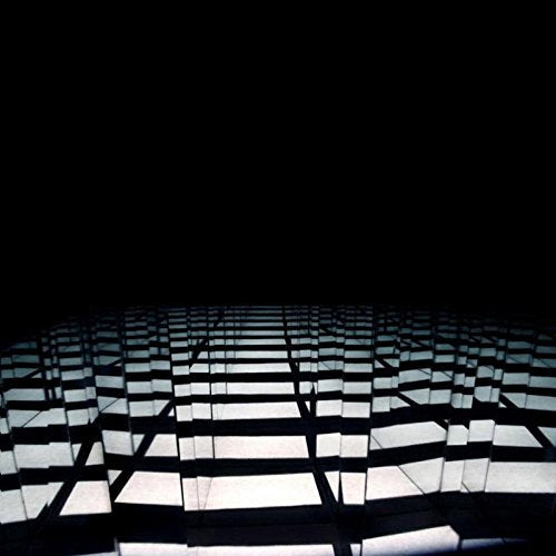 A vinyl record cover featuring a grid pattern with light and dark shadows.