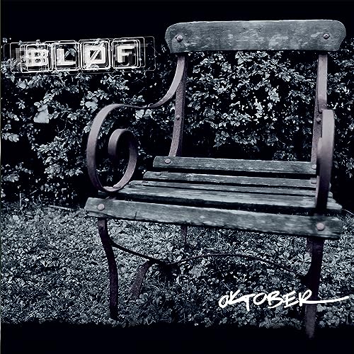 Blof album cover: weathered park bench against a leafy backdrop.