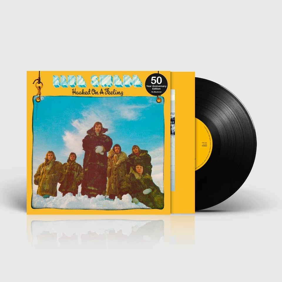 Vinyl record and album cover featuring Blue Swede in fur coats in the snow.