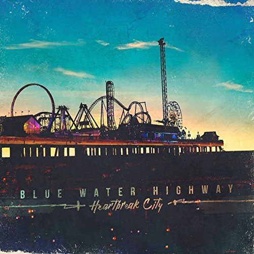 Vinyl album cover: silhouette of an amusement park against a blue sky.
