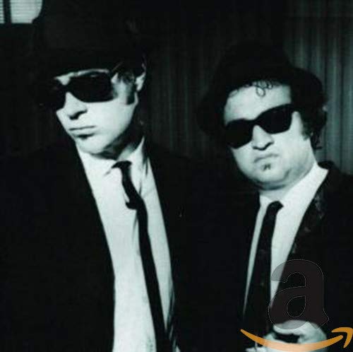 Blues Brothers Jake and Elwood Blues in black suits and sunglasses.
