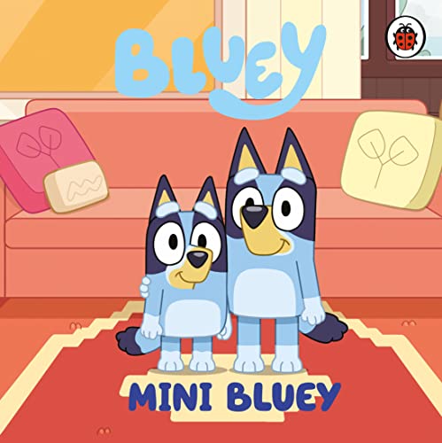 Bluey and Bingo, cartoon dogs, stand on a red rug in front of a sofa.