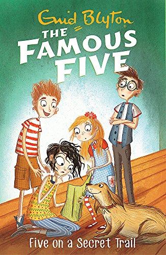 Book cover illustration featuring the four Famous Five children and their dog looking at paper.