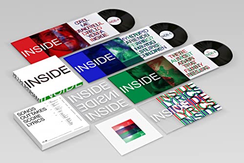 Bo Burnham Inside vinyl record set including sleeves, records, and printed inserts on grey.