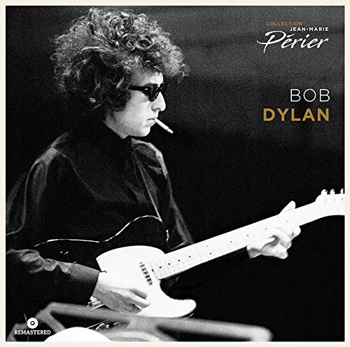 Black and white portrait of Bob Dylan playing guitar, smoking.
