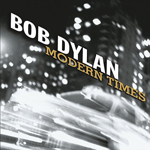 Bob Dylan's "Modern Times" vinyl album cover, black and white, blurred lights.
