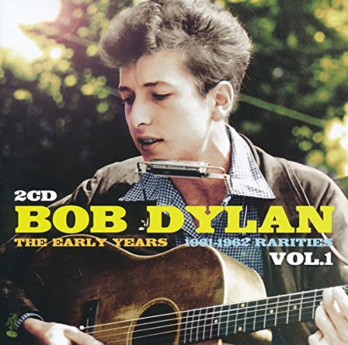 "CD cover featuring Bob Dylan playing guitar and harmonica, with title and volume text."