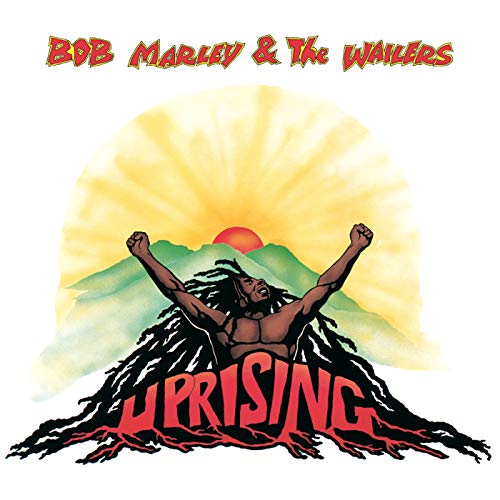 Bob Marley album cover: a man with dreadlocks raising fists before a sunrise.
