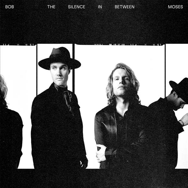 Black and white portrait of Bob Moses band members, grainy texture.