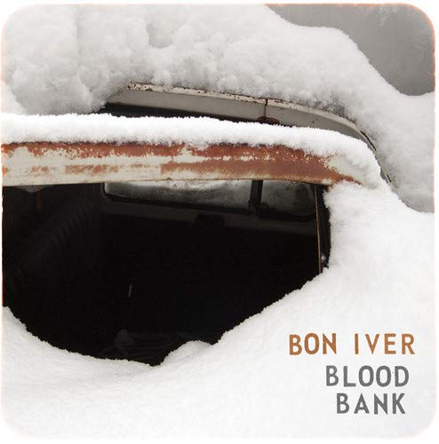 Bon Iver's "Blood Bank" vinyl cover: a snow-covered car roof and text.