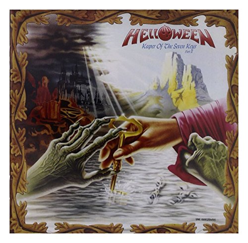 Helloween album cover: skeletal hand offering a key to a human hand.